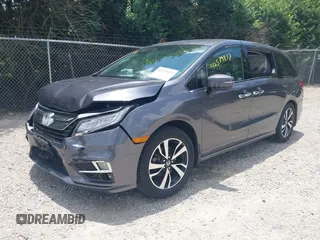 2018 Honda Odyssey Elite with VIN 5FNRL6H95JB087952, listed as a IAAI auction lot 42579817 with 96,577 mi miles and . Bid and sale history available at DreamBid. Image 2.