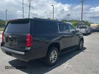 2018 Chevrolet Suburban LS with VIN 1GNSCGKC7JR316242, listed as a Copart auction lot 55782715 with 239,977 mi miles and Clean Title. Bid and sale history available at carsss.com. Image 4.