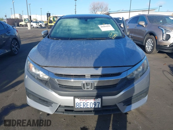 2018 Honda Civic LX with VIN 2HGFC2F58JH571072, listed as a IAAI auction lot 41684450 with 66,032 mi miles and . Bid and sale history available at carsss.com. Image 12.