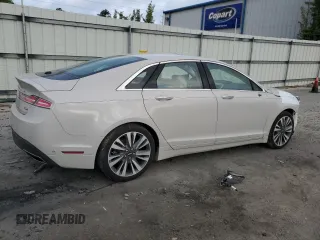 2019 Lincoln MKZ Hybrid Reserve II with VIN 3LN6L5MU9KR633669, listed as a Copart auction lot 51943355 with 98,581 mi miles and Salvage title. Bid and sale history available at DreamBid. Image 3.