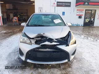 2015 Toyota Yaris L with VIN VNKJTUD36FA036518, listed as a IAAI auction lot 41233406 with 138,481 mi miles. Bid and sale history available at carsss.com. Image 12.