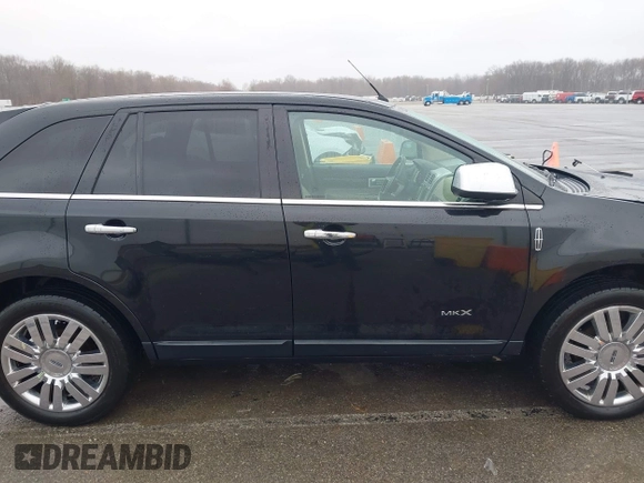 2010 Lincoln MKX with VIN 2LMDJ6JC3ABJ21373, listed as a IAAI auction lot 41843187 with 153,958 mi miles. Bid and sale history available at carsss.com. Image 14.