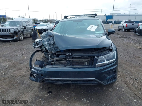 2019 Volkswagen Tiguan S with VIN 3VV0B7AX8KM178139, listed as a IAAI auction lot 41860225 with 97,980 mi miles. Bid and sale history available at carsss.com. Image 12.