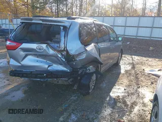 2016 Toyota Sienna XLE with VIN 5TDYK3DC3GS744752, listed as a IAAI auction lot 41077851 with 147,319 mi miles. Bid and sale history available at carsss.com. Image 4.
