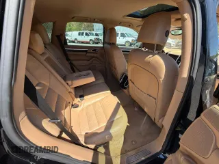 2012 Porsche Cayenne S Hybrid z VIN WP1AE2A28CLA94048, wystawiony jako Copart lot #56879555 z przebiegiem 129 448 mil mil oraz Tytuł czysty. Historia ofert i sprzedaży dostępna na DreamBid. Obrazek 6.