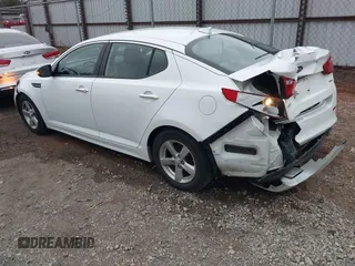 2015 Kia Optima LX with VIN KNAGM4A74F5587415, listed as a IAAI auction lot 41184428 with 128,549 mi miles. Bid and sale history available at carsss.com. Image 3.