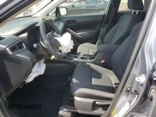 2023 Toyota Corolla Cross LE with VIN 7MUCAABG4PV054828, listed as a Copart auction lot 59466855 with 23,884 mi miles and Salvage title. Bid and sale history available at DreamBid. Image 7.