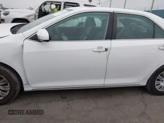 2014 Toyota Camry L with VIN 4T4BF1FK1ER416128, listed as a IAAI auction lot 42030370 with 79,475 mi miles and . Bid and sale history available at DreamBid. Image 14.