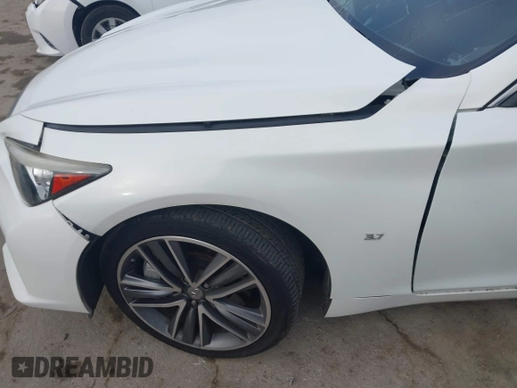 2014 Infiniti Q50 Premium with VIN JN1BV7AP0EM688888, listed as a IAAI auction lot 41537933 with 114,260 mi miles and . Bid and sale history available at carsss.com. Image 19.