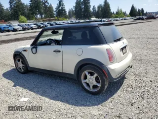 2006 MINI Hardtop with VIN WMWRC33586TJ77908, listed as a Copart auction lot 55095525 with 143,810 mi miles and Salvage title. Bid and sale history available at DreamBid. Image 2.