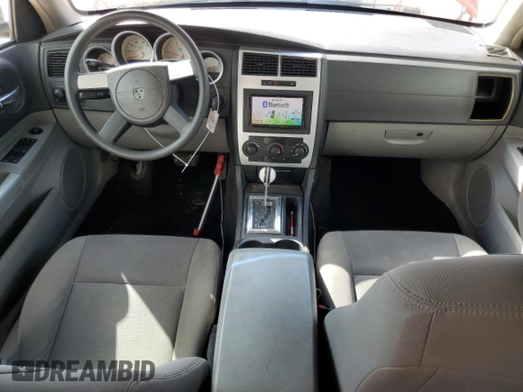 2007 Dodge Magnum z VIN 2D4FV47V27H712975, wystawiony jako Copart lot #48071805 z przebiegiem 193 530 mil mil oraz Nie do naprawy • Non repairable. Historia ofert i sprzedaży dostępna na DreamBid. Obrazek 8.