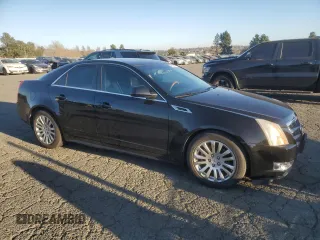 2011 Cadillac CTS Performance with VIN 1G6DJ5EY0B0146964, listed as a Copart auction lot 42524475 with 135,514 mi miles and Salvage Title. Bid and sale history available at carsss.com. Image 4.