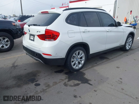 2014 BMW X1 xDrive28i z VIN WBAVL1C54EVY23533, wystawiony jako IAAI lot #41949759 z przebiegiem Nie podano mil oraz . Historia ofert i sprzedaży dostępna na DreamBid. Obrazek 4.