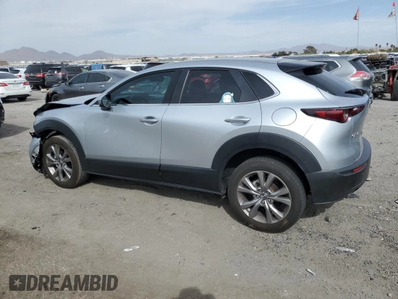 2021 Mazda CX-30 Select with VIN 3MVDMABLXMM256327, listed as a Copart auction lot 51185235 with 76,630 mi miles and Salvage Title. Bid and sale history available at DreamBid. Image 2.