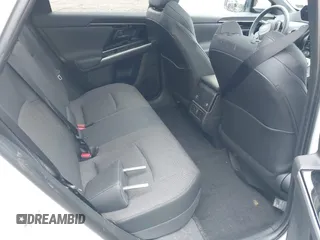 2024 Toyota bZ4X XLE z VIN JTMABACA6RA079545, wystawiony jako IAAI lot #42013641 z przebiegiem 1 550 mil mil oraz . Historia ofert i sprzedaży dostępna na DreamBid. Obrazek 8.