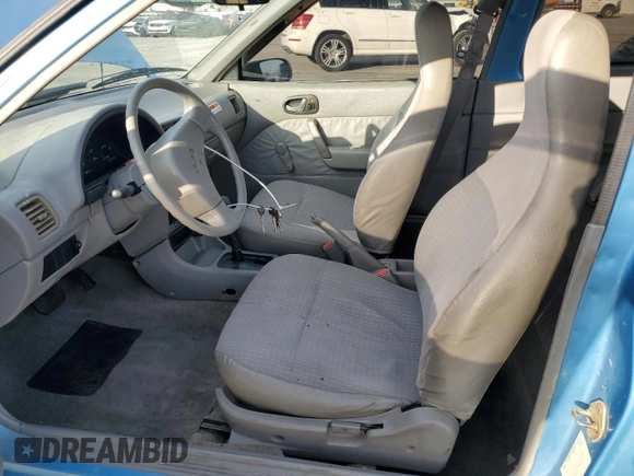 1994 Geo Metro z VIN 2C1MR2467R6780100, wystawiony jako Copart lot #45597135 z przebiegiem 100 000 mil mil oraz Szkoda całkowita • Salvage title. Historia ofert i sprzedaży dostępna na DreamBid. Obrazek 7.