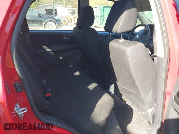 2010 Suzuki SX4 with VIN JS2YB5A34A6301801, listed as a IAAI auction lot 41884838 with 124,381 mi miles. Bid and sale history available at carsss.com. Image 8.