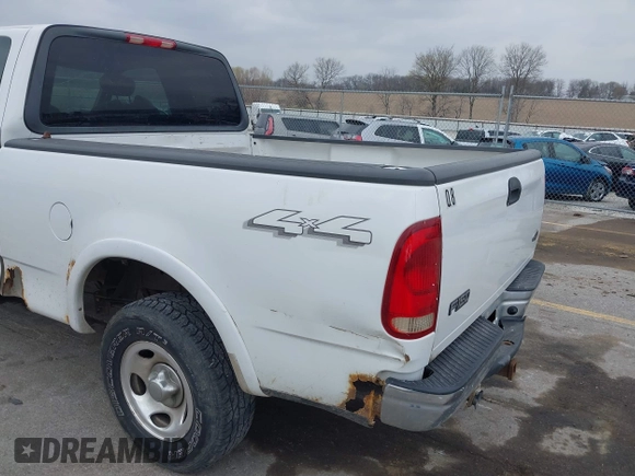 2003 Ford F-150 XL with VIN 1FTRX18L73NB72735, listed as a IAAI auction lot 42016567 with 0 mi miles. Bid and sale history available at carsss.com. Image 12.