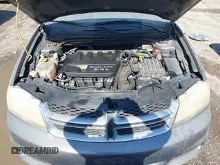 2013 Dodge Avenger with VIN 1C3CDZAB8DN531045, listed as a IAAI auction lot 41885513 with 246,559 mi miles and . Bid and sale history available at DreamBid. Image 10.