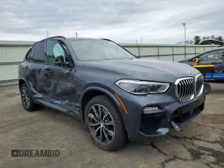 2021 BMW X5 xDrive45e with VIN 5UXTA6C08M9H34879, listed as a Copart auction lot 51859425 with 0 mi miles and Salvage Title. Bid and sale history available at carsss.com. Image 4.