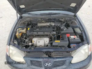 2000 Hyundai Elantra GLS z VIN KMHJF35F9YU032902, wystawiony jako Copart lot #45145955 z przebiegiem 79 229 mil mil oraz Czysty tytuł • Clean title. Historia ofert i sprzedaży dostępna na DreamBid. Obrazek 11.