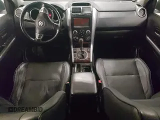 2007 Suzuki Grand Vitara Luxury z VIN JS3TD947774200407, wystawiony jako Copart lot #52001965 z przebiegiem Nie podano mil oraz Szkoda całkowita • Salvage title. Historia ofert i sprzedaży dostępna na DreamBid. Obrazek 8.