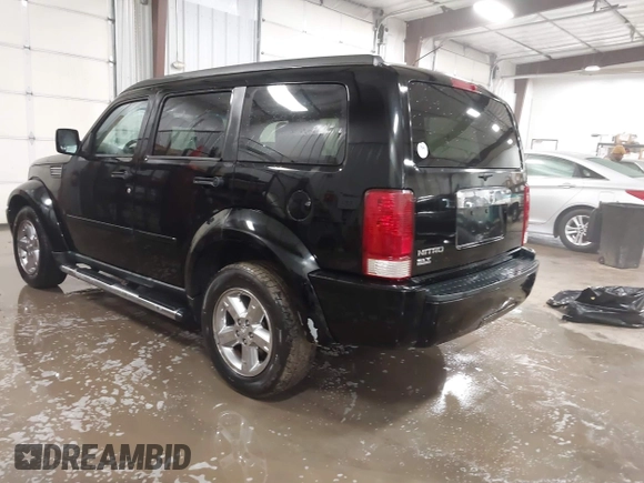 2007 Dodge Nitro SLT with VIN 1D8GT58K77W724530, listed as a IAAI auction lot 41499022 with 214,183 mi miles. Bid and sale history available at carsss.com. Image 3.