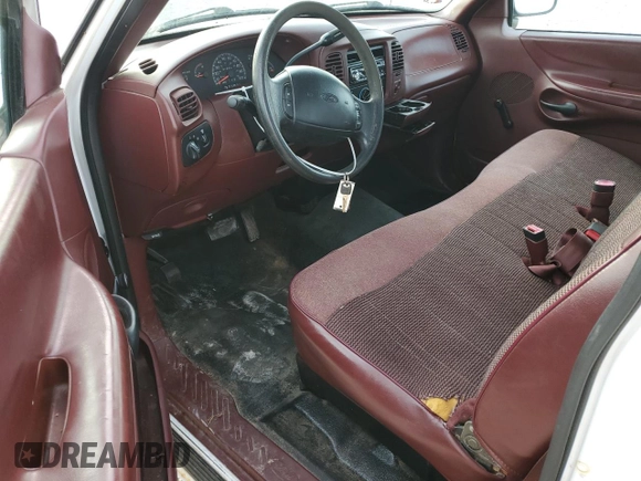 1998 Ford F-150 with VIN 1FTZX17W2WKB25677, listed as a Copart auction lot 54419145 with 319,584 mi miles and Salvage title. Bid and sale history available at DreamBid. Image 8.