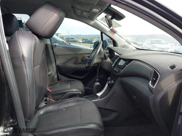 2019 Chevrolet Trax LT with VIN 3GNCJLSB9KL132858, listed as a IAAI auction lot 41960659 with 103,663 mi miles. Bid and sale history available at carsss.com. Image 5.