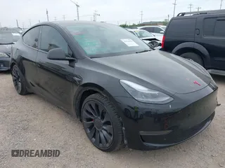 2024 Tesla Model Y Performance z VIN 7SAYGDEF7RA267752, wystawiony jako IAAI lot #42126456 z przebiegiem 21 216 mil mil oraz . Historia ofert i sprzedaży dostępna na DreamBid. Obrazek 1.