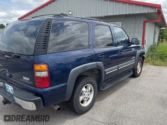 2002 Chevrolet Tahoe LS z VIN 1GNEC13Z92R180341, wystawiony jako Copart lot #59126715 z przebiegiem Nie podano mil oraz Czysty tytuł • Clean title. Historia ofert i sprzedaży dostępna na DreamBid. Obrazek 4.