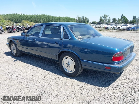 1996 Jaguar XJ with VIN SAJHX1740TC766425, listed as a IAAI auction lot 42758458 with 257,849 mi miles and . Bid and sale history available at DreamBid. Image 3.