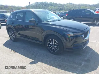 2018 Mazda CX-5 Grand Touring with VIN JM3KFADM2J1324547, listed as a IAAI auction lot 41947497 with 66,254 mi miles. Bid and sale history available at carsss.com. Image 1.
