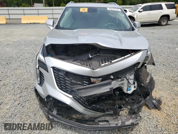 2021 Cadillac XT4 FWD Premium Luxury z VIN 1GYFZCR40MF000293, wystawiony jako Copart lot #58710565 z przebiegiem 49 721 mil mil oraz Szkoda całkowita • Salvage title. Historia ofert i sprzedaży dostępna na DreamBid. Obrazek 5.