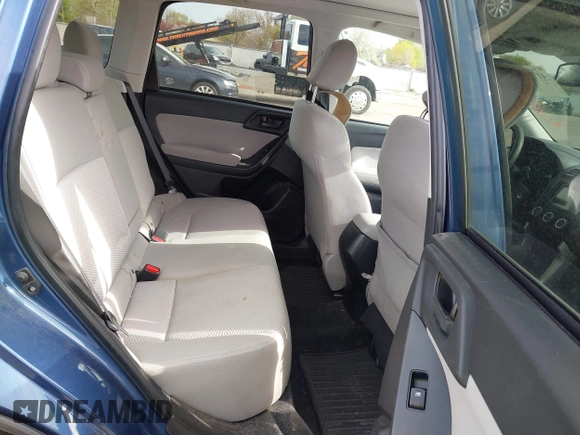 2014 Subaru Forester Premium z VIN JF2SJADC0EH551474, wystawiony jako IAAI lot #41977613 z przebiegiem 62 979 mil mil oraz . Historia ofert i sprzedaży dostępna na DreamBid. Obrazek 8.