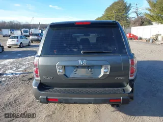 2007 Honda Pilot LX with VIN 2HKYF18197H504905, listed as a IAAI auction lot 41293667 with 200,448 mi miles. Bid and sale history available at carsss.com. Image 16.