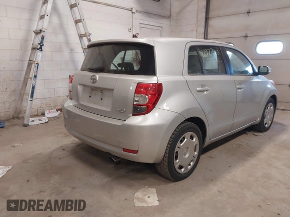 2010 Scion xD with VIN JTKKU4B40AJ057503, listed as a IAAI auction lot 41977965 with 202,538 mi miles. Bid and sale history available at carsss.com. Image 6.