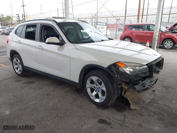 2015 BMW X1 sDrive28i with VIN WBAVM1C53FV318663, listed as a IAAI auction lot 41711526 with 182,204 mi miles. Bid and sale history available at carsss.com. Image 1.