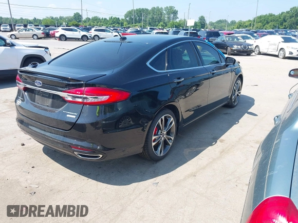 2017 Ford Fusion Titanium with VIN 3FA6P0K9XHR117300, listed as a IAAI auction lot 42731703 with 47,276 mi miles and . Bid and sale history available at DreamBid. Image 4.