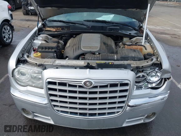 2006 Chrysler 300 C with VIN 2C3KA63H16H352507, listed as a IAAI auction lot 41926057 with 129,962 mi miles. Bid and sale history available at carsss.com. Image 10.