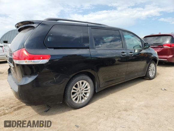 2011 Toyota Sienna XLE AAS with VIN 5TDYK3DC5BS081015, listed as a Copart auction lot 61096595 with 291,855 mi miles and Salvage title. Bid and sale history available at DreamBid. Image 3.