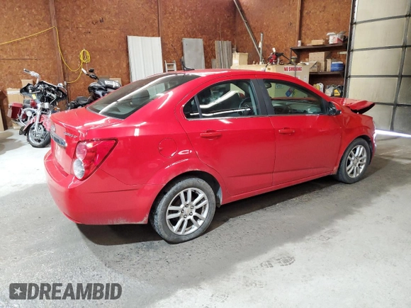2012 Chevrolet Sonic LT z VIN 1G1JC5SH3C4140111, wystawiony jako Copart lot #57206595 z przebiegiem 126 223 mil mil oraz Szkoda całkowita • Salvage title. Historia ofert i sprzedaży dostępna na DreamBid. Obrazek 3.
