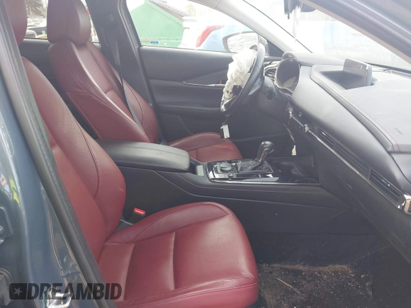 2023 Mazda CX-30 S Carbon Edition with VIN 3MVDMBCM8PM502891, listed as a IAAI auction lot 42050533 with 20,035 mi miles and . Bid and sale history available at DreamBid. Image 5.
