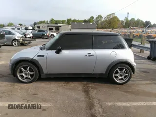2002 MINI Hardtop with VIN WMWRC33432TE10226, listed as a IAAI auction lot 41973956 with 156,445 mi miles and . Bid and sale history available at DreamBid. Image 14.