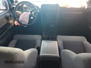 2010 Jeep Wrangler Sport с VIN 1J4AA2D12AL169186, выставлен на аукционе Copart как лот 57546115 с пробегом 277 897 миль миль и Списание • Salvage title. История ставок и продаж доступна на DreamBid. Изображение 8.