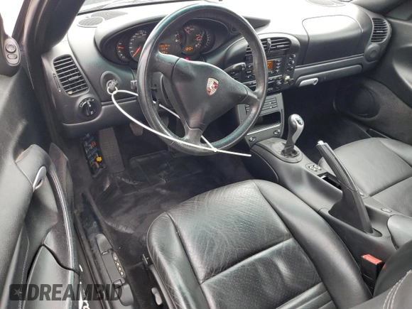 2003 Porsche 911 with VIN WP0AA29983S622403, listed as a Copart auction lot 61023595 with 155,938 mi miles and Salvage title. Bid and sale history available at DreamBid. Image 8.