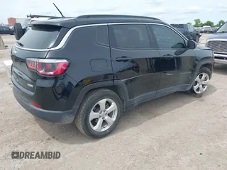 2018 Jeep Compass Latitude with VIN 3C4NJCBB6JT108842, listed as a IAAI auction lot 42221324 with 112,046 mi miles and . Bid and sale history available at DreamBid. Image 4.