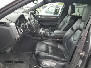 2011 Porsche Cayenne S with VIN WP1AB2A2XBLA55565, listed as a Copart auction lot 63094305 with 105,250 mi miles and Salvage title. Bid and sale history available at DreamBid. Image 7.