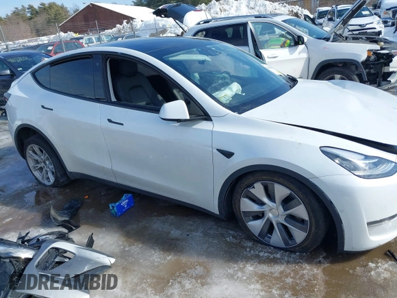 2022 Tesla Model Y Long Range with VIN 7SAYGDEE1NA013066, listed as a IAAI auction lot 41646912 with Not Provided miles and . Bid and sale history available at DreamBid. Image 13.