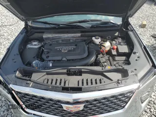 2025 Cadillac XT4 FWD Premium Luxury z VIN 1GYFZCR43SF128251, wystawiony jako Copart lot #59265035 z przebiegiem 7 271 mil mil oraz Czysty tytuł • Clean title. Historia ofert i sprzedaży dostępna na DreamBid. Obrazek 12.